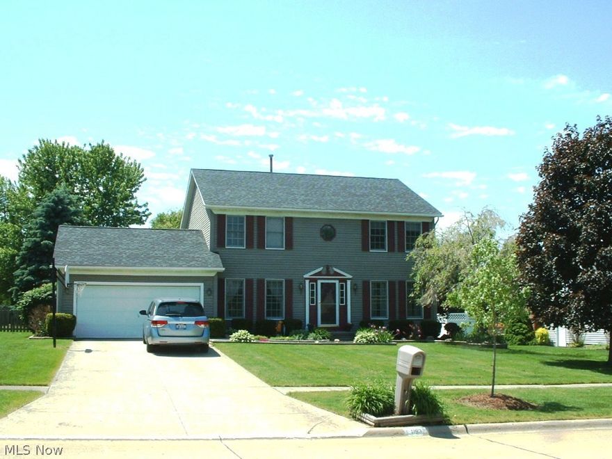 Beautiful, move in ready 2 story home with spacious fenced rear yard. Stunning vaulted master suite that includes a walk-in closet and large, open master bath with skylight. Private living room or office, spacious kitchen with oak cabinets, wood flooring and center island with large eating area open to the family room with wood burning fireplace, formal dining room with tray ceiling, crown molding and chair rail. Three additional nice sized bedrooms and a first floor laundry. Partially finished and partitioned basement includes a large room that could be used as a playroom or gym, a downstairs office and plenty of storage! The ample backyard includes a large deck, storage shed, plenty of trees and enough room to add a pool or large garden. This house is in a quiet neighborhood that has pride of ownership, as well as excellent proximity to schools, shopping, parks and splash pad.