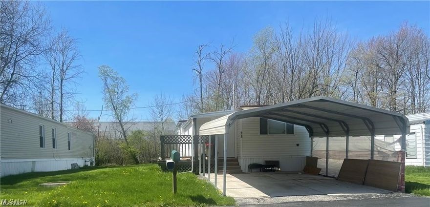 Welcome to Apple Creek mobile community! This home features 2 bedrooms, 1 bath, an open living room area, and a kitchen with eat in space. There has been new flooring and wall paper added to the kitchen a new shower system was installed in the bathroom, both rooms have had the closets updated, reconstructed deck, stairs and a bonus room was built in the front entrance.This is a very nice mobile home that provides comfort and space to relax. Minutes away from a major highway, shopping plazas, restaurants and RTA transportation. Schedule your showing today!