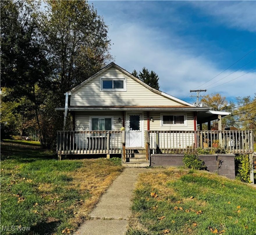 Come and see this cute 2-bedroom, 1-bath cottage situated in the quaint community of Lloydsville. Enjoy the peace of a small-town setting with easy access to Interstate 70. Sitting on a nice, flat lot, this home features a welcoming wraparound porch - the perfect spot to relax and enjoy your morning coffee. With a little vision and TLC, this property can be a charming primary home or a fantastic investment opportunity. Don't miss this chance to own this charming cottage with great potential in a convenient location. Ask your favorite real estate professional to set up a showing!
