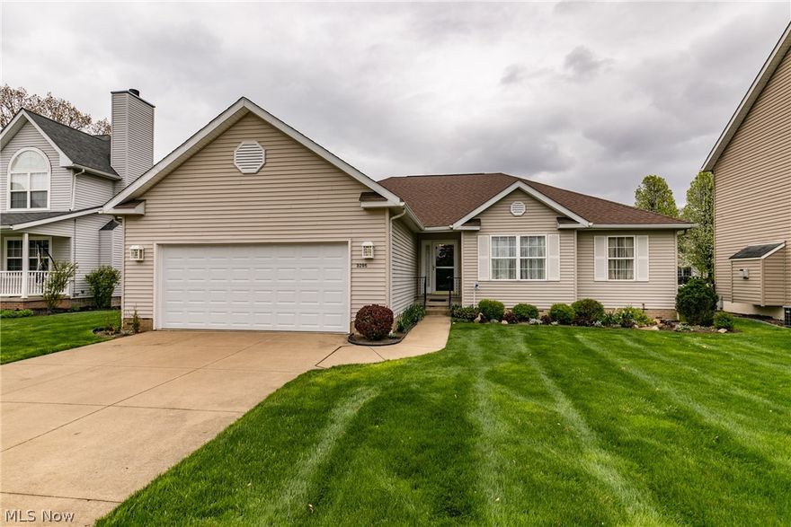 A remarkable Cuyahoga Falls 3 bedroom, 2 bath ranch with pristine landscaping.  This home features 1966 square feet, with a first floor laundry, attached 2 car garage, full basement, sun room, covered back porch, and so much more.  The open concept allows for a large kitchen with eating area, as well as space for a formal dining area.  A full master suite is privately in the rear.  The roof is newer, with the furnace and central being replaced in 2020, garage door in 2020, washer/dryer and dishwasher in 2019.  There is a fireplace, multiple sliders, foyer,. and so much more.