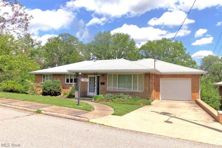 TAKE ADVANTAGE OF THE INCREDIBLE CONVENIENCE within minutes to Rt. 22, schooling and shopping. Easy, one level living is yours in this brick home located in Greenlawn Estates. This traditional floor plan delivers 3 bedrooms, 2 bathrooms, classic living room and huge recreation room with wet bar and woodburning fireplace.  Comfortable, covered redwood deck overlooking a wooded back yard great for enjoying nature.