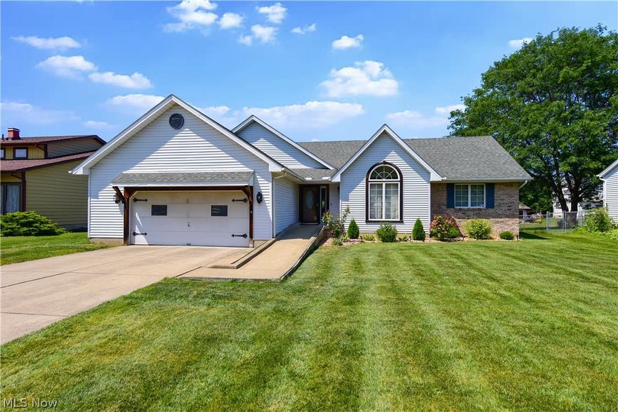 This spacious open concept ranch has everything you are looking for and more! Turn key ready home on a quiet cul de sac street is ready for you to move right in. New grey LVP flooring and carpet throughout, vaulted ceilings, and a fully finished basement make this home a must see. Built with wheelchair accessibility in mind, there is a concrete ramp to the front door, wide hallways and a no lip shower in the master bath. The grounds include a fenced in back yard and large concrete patio in back with mature privacy landscaping.