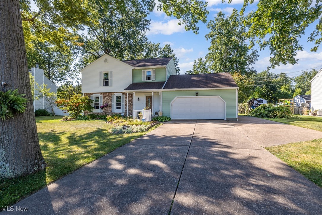 Welcome to this beautifully maintained and updated 4 bed 2 full bath colonial in Amherst, on a HALF ACRE lot. This home has it all! The updated kitchen features beautiful maple kraftmaid cabinets, granite countertops, all appliances staying, and a kitchen island great for entertaining which is open the large dining room. In the dining room there is a door that leads to the back deck overlooking the spacious yard which is an oasis of its own! This home boasts Over 1900 sq ft, plus the finished basement, and the attached sunroom which is approx. another 220 sq ft. Off the kitchen is an area which can be used as a mudroom or as a built in office space or coffee bar, its attached to the enclosed sunroom which is perfect for this time of year! Both the full bathroom upstairs and the full bathroom on the main level have been updated. Upstairs features 4 very good size bedrooms , all with new closet doors, and trim. Next is the basement- it is finished and ready to be used which also features the laundry room with the washer and dryer staying ( the laundry room is not finished) Outside is the ready awaiting oasis. There is the deck, a paver patio, the enclosed sunroom , and the above ground pool. Love gardening? There is a meticulously maintained flower garden with tons of perennials, a little grape vineyard, and blackberries! Most of the home has been freshly painted, new trim in some rooms, new insulated garage door on the attached 2 car garage! partially fenced in yard ( neighbors fences). Shed for extra storage. Don't miss your opportunity to be the next owner(s) of this gem in Amherst. Home warranty included for added peace of mind!
