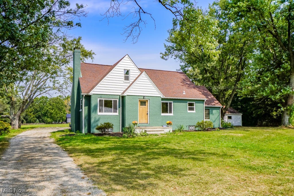 You don't want to miss this beautifully remodeled cape cod on 3 peaceful country acres with thoughtful updates inside and out! You’ll appreciate the many improvements, including new windows, exterior doors, a 95% efficient furnace, A/C, hot water tank, updated plumbing, and a waterproofed basement.
Step inside to a light filled living room with a wood burning fireplace and a picture window that fills the room with light. New LVP flooring continues into the eat-in kitchen, featuring custom epoxy countertops, stainless steel appliances, a breakfast bar, and a dining area that’s just right for family meals. Two bedrooms and a brand new full bath with a tub and stylish tile surround complete the main level. Upstairs, the spacious master bedroom offers built-ins and a convenient half bath.
The lower level adds even more room to enjoy with a rec room featuring an open joist ceiling and glass block windows, plus another full bath and walk-up access to the attached one car garage. Car enthusiasts will love the garage space along with a 4 car detached garage with electric and all new doors and openers.
The combination of modern updates, 3 acres of peaceful country living, and incredible garage space makes this a must-see ~ call today to schedule your tour!