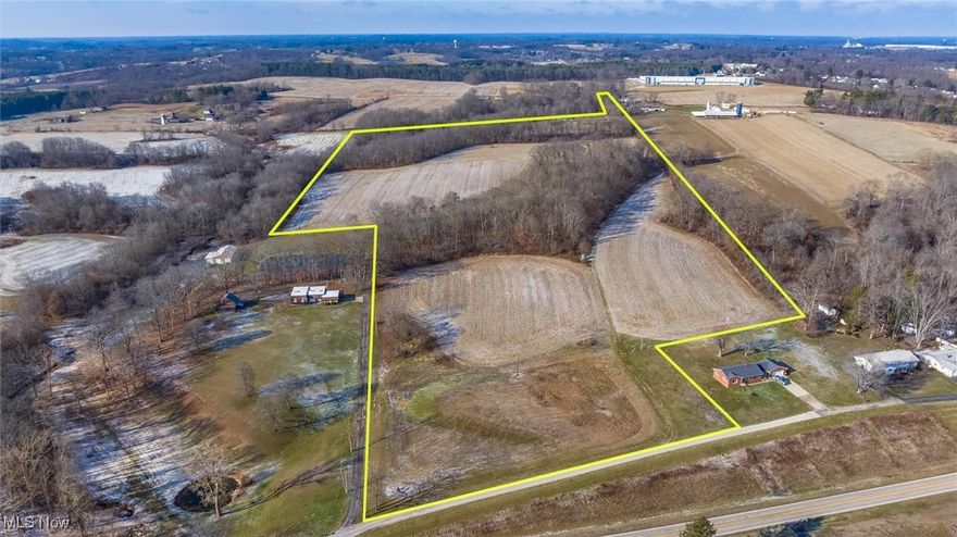 This 49.25-acre property offers a rare combination of income, accessibility, and future potential. Approximately 20 acres are currently farmed for crops, providing immediate agricultural use. The property features excellent access to I-70, making it an ideal candidate for a future housing development, private estate, or working farm. An oil and gas well located on the property provides income, and any owned mineral rights will transfer to the new buyer. Public water and sewer are available at the buyer’s expense. A versatile opportunity with multiple possible uses.