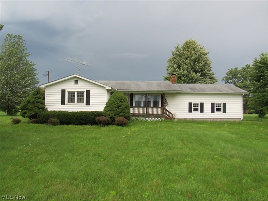 One floor living!  This is a sprawling ranch style home with full basement.  There was a 4th bedroom suite added that includes a full bathroom.  All bedrooms are good size.  It also features a detached garage that could be a workshop or storage for more vehicles or toys.  The home is on acreage and possibilities are endless with this property.  Come and See!