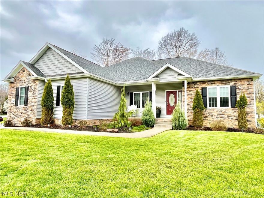 Truly Better than New! This 5+ year young, 1,818 square foot, 3 bedroom 2 bath ranch style beauty has been lovingly cared for and improved upon since it was first skillfully built in 2018. Featuring an open floor plan that allows for togetherness as the eat-in kitchen, dining area and living room all blend together seamlessly! The kitchen boasts an island with granite top, stainless steel appliances, pantry and breakfast nook. The living room is highlighted by a gas fireplace and coffered 9 ft ceilings. Retire to the outstanding Owner's suite that is set apart from the other 2 generously sized bedrooms, making the Owner's suite your own private oasis! The Owner's bath offers a claw-foot soaking tub, glass enclosed tile shower, walk-in closet and private commode area. The basement was well planned with plumbing in place for a 3rd full bath along with an egress window should you decide to finish it as a 4th bedroom or family room area. First floor laundry that includes the washer and dryer, 2 car attached garage, High Efficiency gas furnace, enclosed back porch that serves as a mudroom from the fenced back yard that is complete with a pergola with 3 species of grapes, raspberries and strawberries, in-laid brick patio, composite deck and a 12 x 20 shed with electric. Concrete drive plus a turn-a-round or additional parking spot. Corner lot, professionally landscaped. Truly a fantastic home inside and out!