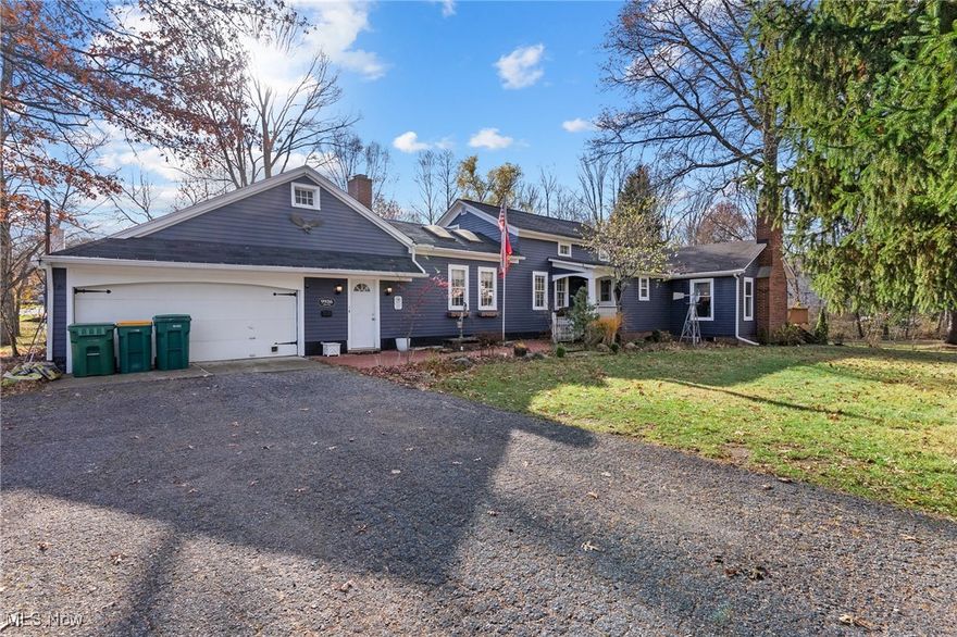 Discover the perfect blend of historical charm and modern convenience with this remarkable Mentor property—an ideal sanctuary for families seeking both elegance and functionality. The heart of the home is the inviting eat-in kitchen, featuring warm light brown cabinetry, ample storage, sleek modern lighting, and stunning quartz countertops. A large quartz island anchors the space, offering both a prime prep area and a natural gathering spot, delivering professional-grade appeal for serious home chefs.

Historic character shines throughout, creating an atmosphere rich with timeless appeal. Two distinct gathering spaces offer versatility: the dining area centers around a cozy wood-burning fireplace, setting the stage for memorable meals and holiday celebrations, while the living room elevates relaxation with its own wood-burning fireplace, impressive wood beam ceilings, and a convenient wet bar—perfect for entertaining.

The first-floor primary suite provides exceptional comfort, with custom built-in closets offering efficient organization. The attached primary bathroom feels like a personal spa, complete with a luxurious jetted tub for unwinding at day’s end. Two additional second-floor bedrooms offer flexibility for family or guests.

Car enthusiasts and practical homeowners alike will appreciate the attached four-car garage. Step outside to a private backyard oasis surrounded by natural beauty, ideal for peaceful retreat or outdoor enjoyment. The unfinished basement adds even more potential, serving as a blank canvas ready for your creative vision.

Schedule your showing today!