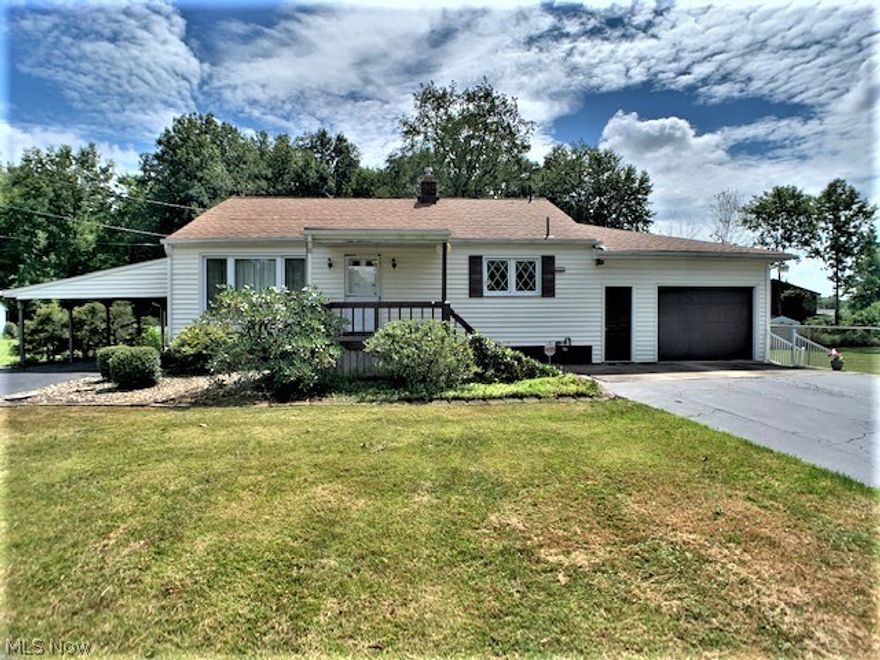 Beautiful, well kept 3 bedroom, 2 bath Ranch on a park-like setting.  The living room is open to the dinette and updated kitchen, all appliances stay, new ceramic tile flooring and bar with white cabinets. Spacious master bedroom & bath. The windows are newer except the one by the garage.  The roof is 8 years old, furnace is newer (the motor was replaced in 2020).  New GFI, newer outside doors, 1 1/2 car garage and huge 2 car carport.  Nice basement with full bath.  Deck and beautiful flower beds..Come take a look.