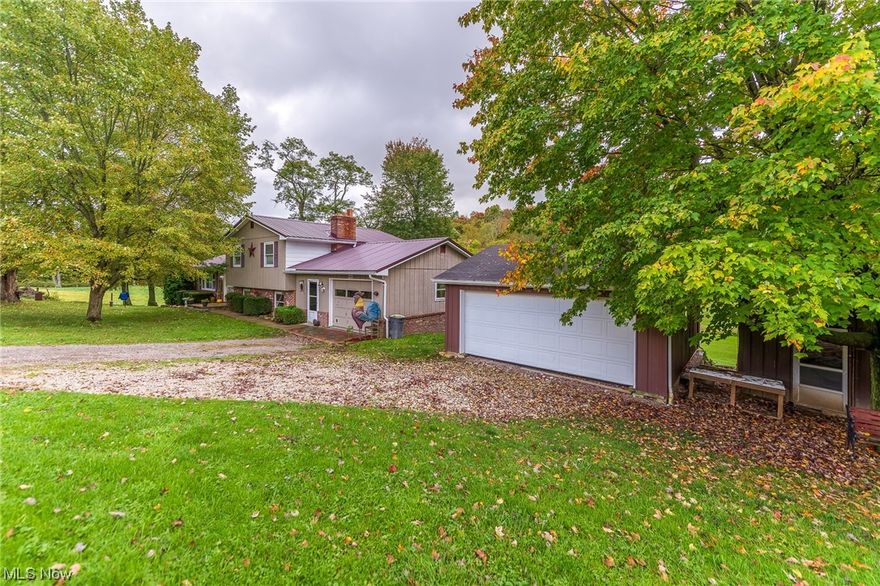 LOCATION LOCATION LOCATION!! Talk about seclusion on your 4 acre property! Walking through this home you can tell this home stayed in the family from the time it was built. Home features a two car detached garage with your very own chicken coup. Amazing back yard with a ton of trees at the back of the lot. Nice out building to make your mini farm. This house is a must see and will go fast. Great location and over all an amazing property.