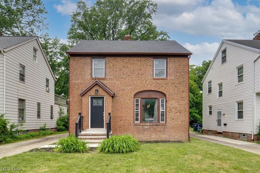 Welcome to this stunning brick colonial in Cleveland Hts. This fully renovated home offers a combination of classic charm & modern updates. With 5 bedrooms and 2 baths, you will have ample space for comfortable living and entertaining. Step inside to a spacious living room, adorned with new vinyl floors & abundant natural light. The open floor plan seamlessly connects the living room to the dining area, creating an ideal space for gatherings. The kitchen boasts stainless steel appliances and an abundance of cabinetry with a bonus nook featuring a built-in coffee bar. Head to the 2nd level to 4 bedrooms, each offering its own unique charm and nice sized closets. The second bathroom has been updated with modern fixtures and finishes. This unique home has a large 5th bedroom on the 3rd level. If that isn't enough, the basement is finished with a built in bar. Brand new roof and AC too.  Outside, the backyard provides a private oasis for relaxation & outdoor entertaining. Whether you prefe