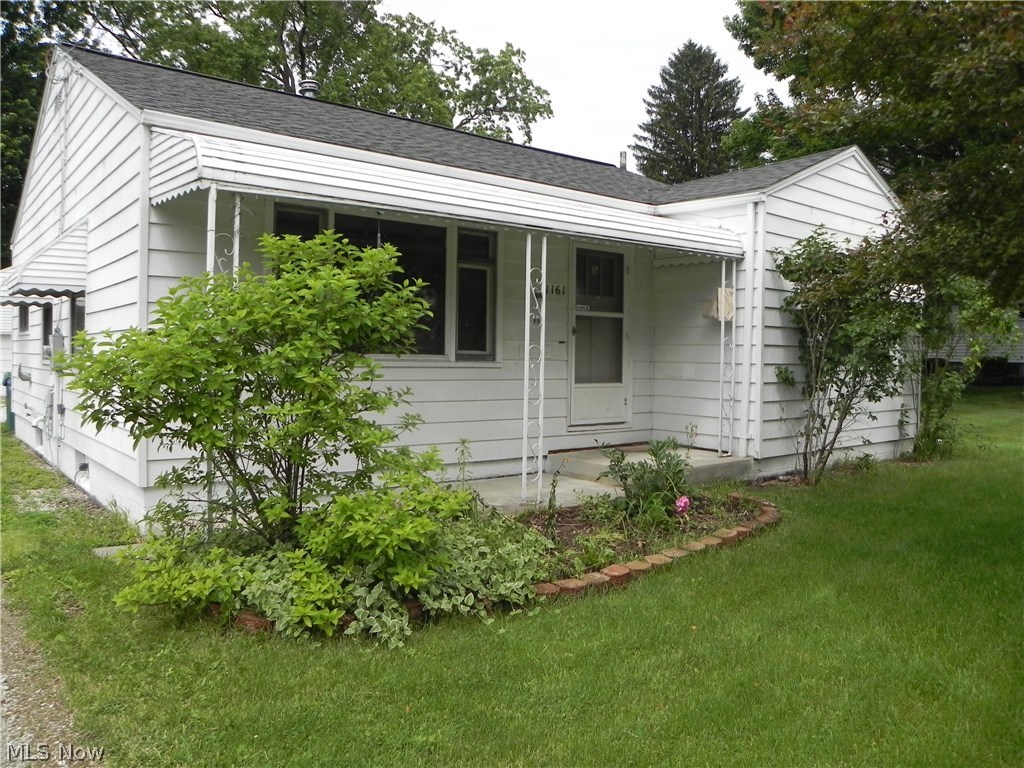 Feels like home...updated kitchen with appliances, hardwood floors through out. Updated bathroom, washer and dryer stay. Sunroom adds additional living space. Easy to maintain yard, and room for 3 cars. Come See!!!!!