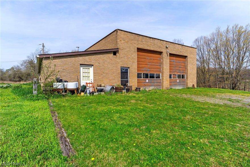 Stunning Property Is Beautifully Situated On 30 Sprawling Acres of Land. One of The Highlights Of The Property is The Massive 3364 Sq. Ft Outbuilding with Attached Apartment and Car Lift, Perfect for Storing Equipment, Vehicles or For Use Of a Workshop. Commercially Zoned With Potential To Run Profitable Business. Prime Location On Rt 224 in Ellsworth Township. In Addition to The Workshop You Will Find A 3/4 Stocked Pond, The Property Is Stunning Featuring Lush Natural Landscape, and Plenty Of Space For Additional Construction. The Surrounding Acreage Offers Ample Opportunities For Activities, From Hiking, Hunting, Gardening And More. Overall, This Property Is A Rare Find Offering A Perfect Blend Of Commercial Opportunity And Natural Beauty. Don't Miss Out On This Incredible Opportunity To Own This Expansive Acreage In A Prime Location. Property Is Zoned Commercial But Has Existing Residence. Gas Well On Property With Free Gas.