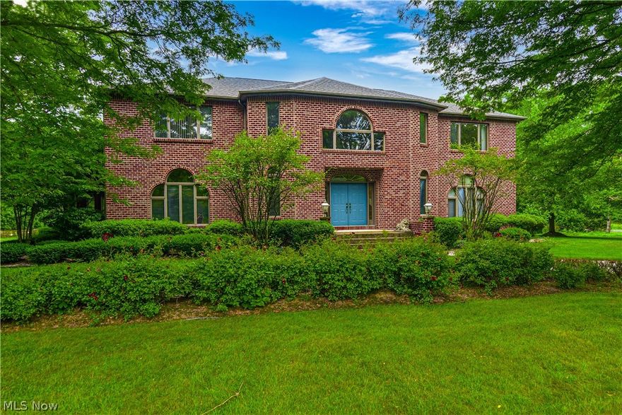 SPECTACULAR 6 Bedroom/6 & 1/2 Bath ALL BRICK Home with AMAZING Attention to Detail with SUPERIOR Quality of Construction.  Home Features Include:  PHENOMENAL Dual Curved Staircase & Swarovski Chandalier, Hallway with Double Closets leading to an AMAZING Large Open Great Room with Fireplace, AWESOME Updated Kitchen with Center Island, Tons of Cabinets, Granite Counter Tops, Trendy Back Splash & Stainless Steel Appliances.  The Kitchen is Open to the Living Room with Wood Burning Fireplace & Sun Room.  Home also offers a Formal Dining Room, Half Bath, First Floor Master Suite with His/Her Walk in Closets, Double Sinks, Jacuzzi Tub, & Floor to Ceiling Tile Shower, AND a 2nd Mini Master Bedroom with Full Bath.  Second Floor offers 4 Extremely Large Bedrooms- ALL With Walk In Closets - and 2 Jack & Jill Baths.  The Lower Level is Completely Finished with a Huge Family Room Area, Large Rec. Room Area, Exercise Area, Movie Theater Room & Full Bath.  The Great Room leads to an awesome Back Bri