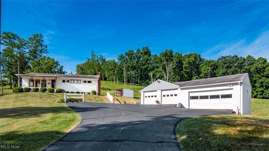 Pack you bag and move in! Meticulously maintained ranch-style home featuring three bedrooms and full bath on the main level, with a second living space, tons of storage, laundry and second full bath within the basement. The timeless hardwood floors appear as new as the day they were laid. Enjoy the view and endless natural light in the living room. The kitchen features plenty of cabinet storage and leads conveniently to the rear entry and outdoor eating area. The home includes a reverse osmosis and water purification system. The cozy lower living area features a wood stove as a secondary heat source. Winter never felt so warm in this home's basement! Additionally, the basement features a large walk-out with ramp to the side yard for easy access. Minutes from downtown New Concord and Interstate 70, East Muskingum School District, just outside of town! The property includes a beautiful paved driveway leading to a four (4) car garage. UPDATED aerator system installed 2025 with two-year transferrable warranty. This is a rare find! Schedule your showing today!