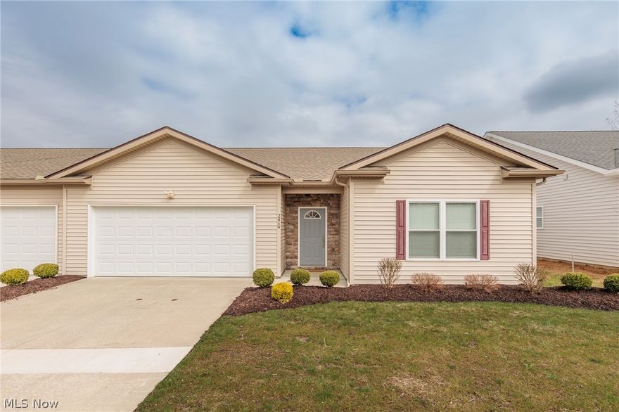 An immaculate 3 bedroom, 2 full bath condo in Pleasant Lakes in Brimfield.  This like new unit has many upgrades, included quartz counter tops, soft close cabinets and drawers, back splash, stainless steel appliances, flooring, lighting, and a walk up attic in the garage for additional storage.  A large master suite has a large walk in closet.  There is a patio, 2 car garage, foyer with coat closet, and so much more.