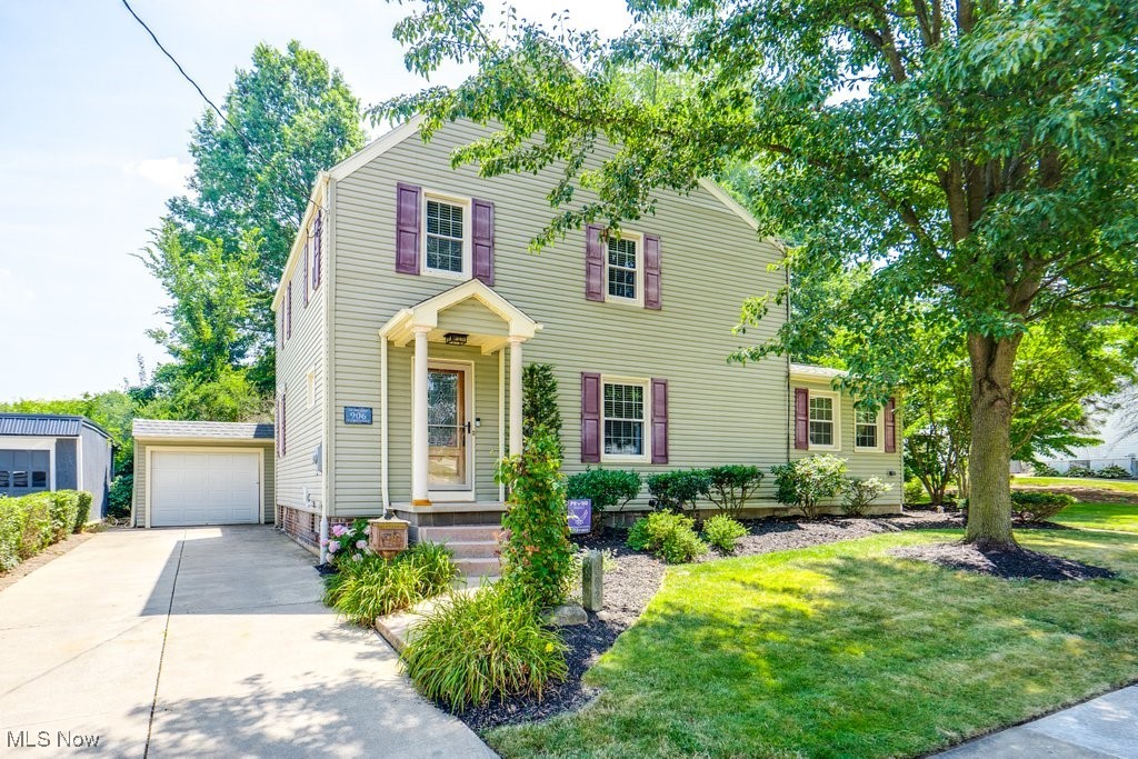 You’ll find plenty of space to spread out in this inviting colonial with over 2400 square feet and a layout that works well for both everyday living and entertaining! The front living or sitting room features original woodwork and new LVP flooring that continues throughout the main floor. A nearby bonus room gives you flexible space for a home office, game room, or rec room, complete with its own mini split for comfortable climate control.
The kitchen, family room, laundry, and half bath were all remodeled in 2021, giving the heart of the home a fresh, modern feel. The kitchen is a great setup for anyone who loves to cook, with granite counters, stainless steel appliances, a sleek tile backsplash, tons of cabinet storage, a coffee bar, and a center island with counter seating and a beverage fridge. It opens to the family room, where a rustic wood accent wall adds warmth and keeps everyone connected. Right around the corner, the dining room stands out with a wood paneled wall, tin ceiling, and French doors that lead to a 700 square foot deck already wired with 220 electric for a future hot tub or spa.
A guest bath and first floor laundry add convenience to the main level. Upstairs, there are four bedrooms and two full baths, including a spacious primary suite with a wood planked ceiling and an en suite that feels like a retreat, featuring a double sink cherry granite vanity and a tiled shower with dual shower heads.
The backyard is beautifully landscaped and includes a screened outbuilding plus a detached garage for parking or storage. With a newer furnace, A/C, and a great location close to schools, shopping, dining, and Paul Brown Tiger Stadium, this home is one you’ll want to see for yourself!