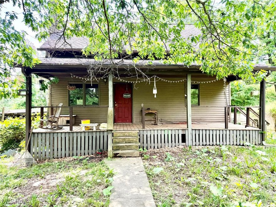 Fixer upper on 4 acres.  septic and public water.  Small barn and horse paddock.  Utilities are off.  selling AS/IS