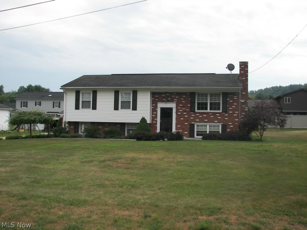 Come See this Well-Maintained 3 bed with 2 1/2 baths and finished basement. This home is located in Wellsville School District but has a nearby Bus Stop for Southern Local. There have been many updates including newer vinyl siding, tilt-wash, vinyl windows, roof on the house and garage. Spacious 3-Car detached garage with two overhead doors and new concrete drive that is 2 years old. The carpet and hardwood floors are about 2 years old. The finished basement has been remodeled approx 3-4 years ago with new tile floor and updated 1/2 bath. Conveniently located in Russell Heights close to the park!