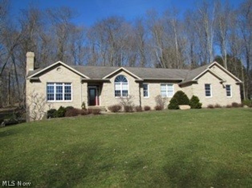 Nestled on 8  wooded acres, this brick ranch home offers one floor living with additional living space in the finished walkout lower level.  The open floor plan includes a Schrock’s cherry kitchen with a bar, dining room and a spacious living room with a fireplace.   The home consists of 4 bedrooms and 3.5 bathrooms.  The much desired master suite has a large walk in shower and a walk in closet.  The lower level has a family room with a wood burner, a full bath, bedroom, office and all kinds of storage.  Schedule your private showing today.