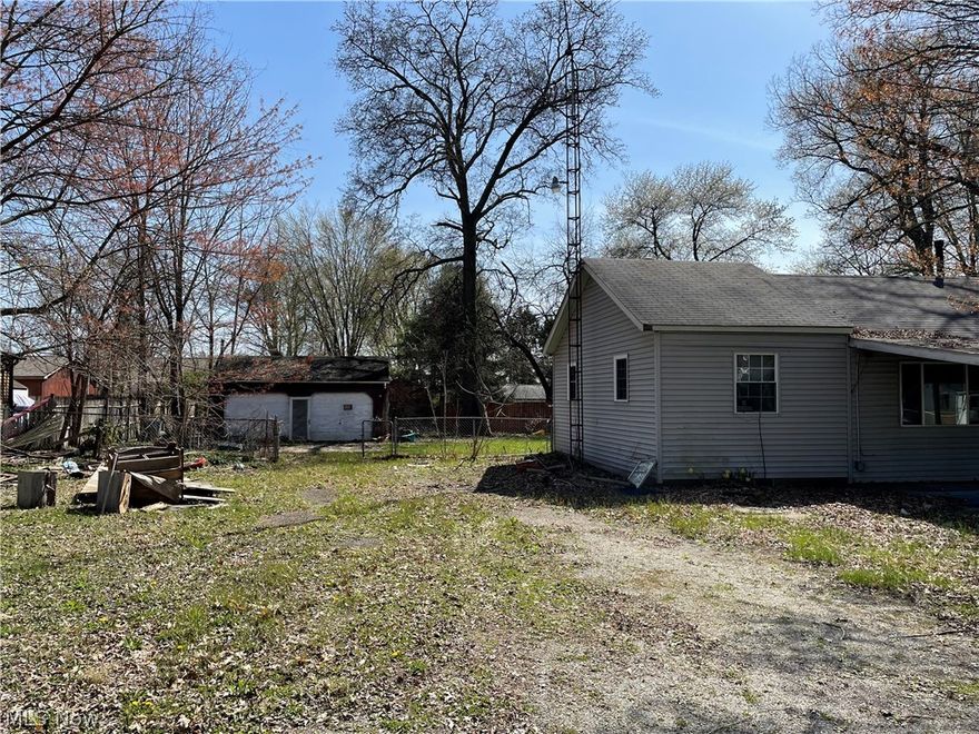 Come take a look at the possibilities for this 3 bed, 1 bath ranch. Great project for a first time flipper and a perfect opportunity to add to your portfolio, or live in and fix up as you go. This home has plenty of land on three adjacent lots, two-car detached garage, and enough space to expand the deck. Schedule your showing today and see for yourself!