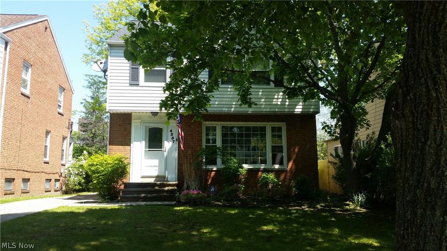 Located in the heart of University Heights, this well maintained Colonial is ready for you to move in.  The kitchen newer cabinets and granite counter tops, stainless steel appliances and ceramic flooring. The formal dining room has hardwood flooring. The living room has a wood burning fireplace and carpeted, perfect to enjoy on a cold night. There are 3 bedrooms upstairs and have been freshly painted. The full bathroom upstairs is updated with custom tiles. There is also a half bath on the main level. The finished basement is equipped with built in surround sound and is perfect for watching a good movie or your favorite team. This home also has a covered porch and a patio to enjoy some summer grilling. Don't forget the huge 2-car garage with keyless entry. Wonderful home in a wonderful community. Call for a showing today.