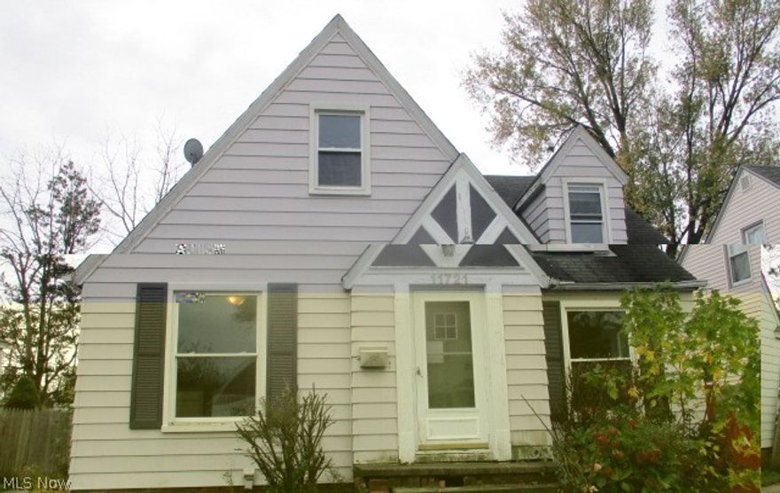 Cute Cape situated near Kamm's Corner.  Great Starter Home!  This spacious home boasts over 1016 sq. ft.  Featuring 3 bedrooms; full bath.  Hardwood floors throughout.  Kitchen provides sufficient cabinetry and counter space with eat in area.  Living room has decorative fireplace with built ins.  Full basement for extra storage.  Your future of owning your own home is just a few steps away.  Close to many anemities Cleveland has to offer.  Add your decorating ideas and make this your home.  Schedule your showing Today!!