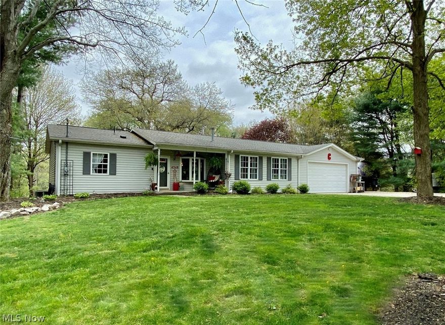 Absolutely gorgeous and completely updated over the past 4 years! Attention to detail is evident the moment you enter this wonderful home.  This spacious ranch with an open floor plan sits on almost 1 acre with large trees and beautiful greenery providing a very secluded feel. Enter the front door into the spacious dining room area and your eyes are drawn to the fabulous kitchen with updated modern cabinets, beautiful Dekton counters, a copper farmhouse sink, custom copper light fixtures, and stainless appliances.  The huge great room is part of an addition added in 1997 and has a vaulted ceiling, woodburner, sliders to the back yard and abundant windows allowing for natural light and views of nature. The 12X12 master bedroom has a double closet with new sliding barn doors, a shiplap accent wall, and a bay window looking into your private back yard!  An updated full bath and additional bedroom complete this level.  The entire first floor has gorgeous Lifeproof “restored wood” luxury vi