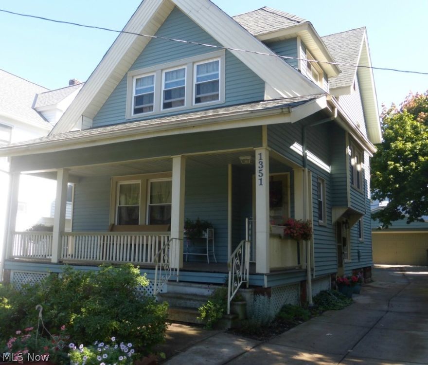 The Charm in this home is flowing out the front door! Lovely four bedroom, 2.5 bath with an extra suite! The inside looks like a magazine layout and you would swear Mrs. Clean lives here!  So many great pictures, it was hard to narrow it down to 25!!  The Old World Charm of this home has been accentuated by the décor and the owner's ability to blend old and new together!  Beautiful woodwork and wood flooring!  Butler's pantry for lots of storage! Partial finished full basement with office or extra room! All new windows in 2013! New roof and air conditioning in the past four years! Two car detached garage with electric and door opener! Home is also handicap accessible! The owner has truly shown the potential of this home! Come see for yourself, especially if you love this era of home building.