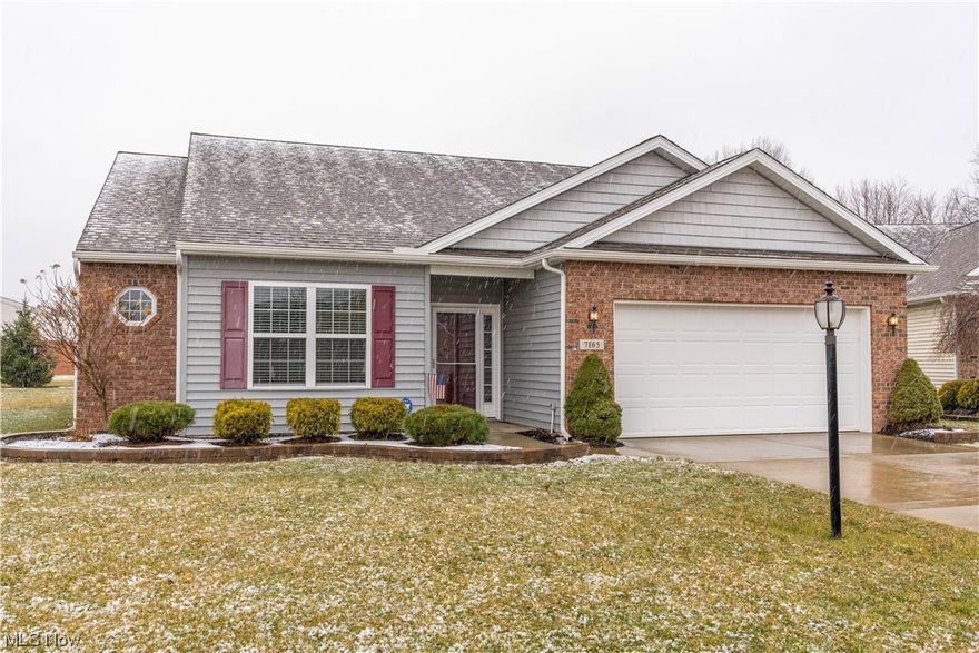 Welcome to Songbird Lane, this meticulously maintained ranch is like new and in mint condition! Beautiful warm tone flooring flows through the foyer and main open-concept living areas. Here you'll find a custom stone face and hearth gas fireplace, natural light flooding through its three windows and views of the manicured lawn. Both formal and casual dining are an option here with a sit up breakfast bar or space for a proper table and chairs. Just through the dining area, a slider leads to a fantastic private outdoor covered porch and extended patio. The kitchen is equipped with plenty of upper & lower cabinet storage, full set of appliances and its own pantry to boot! Just down the hall, first floor laundry, a guest bath and three great sized bedrooms. This large en-suite comes with a massive bathroom, double vanities and walk-in closet - plus more storage! Come see how sweet life can be on Songbird Lane. (Message agent for video walkthrough)