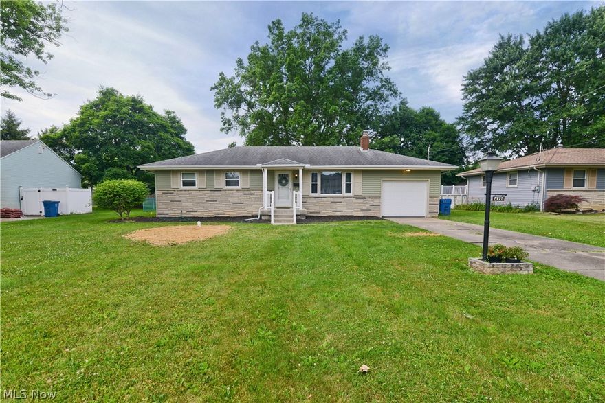 Move in ready ranch in Austintown, close to shopping, highways and restaurants. This might be the perfect find your you! Pulling in the drive you will notice neat and trim lawn and landscaping that is a blank canvas ready to add a few personal touches to make your own. An inviting covered front entry porch adds some character to the front of the home along with the partial brick faced accent to compliment the vinyl siding and 3D Roof of this great home. Walk into hardwood flooring in the main living areas. The pride of ownership and freshly painted interior is enhanced with small touches to create a comfortable space. Spacious living room floods with natural light as does the eat in kitchen with dinette. The cabinets are freshly painted, you will not struggle for counter or cabinet space and the appliances all stay for you. Great space for a coffee bar! Three spacious bedrooms with excellent closet space, fresh paint and hardwood flooring all are close to the first floor full bath. The bath was tastefully blended with some modern and original attributes. Downstairs, the original tile floors were buffed and brought back to life and gleam, there is a great area that could easily be fully finished or leave as it is and use as a rec area! Plenty of space, a huge laundry room complete with washer/dryer. Utility room has additional room for storage as well and don't miss the half bath to complete this basement. Central air here.The freshly painted attached garage is full of storage cupboards, leads to the backyard, has an attic access and the recently updated electric panel can be viewed as well. Outside is a mostly fenced backyard, add a gate to complete for a total close off and enjoy the open space this yard provides. Don't mind the straw in the front yard, the seller is waiting for new green grass to pop up after having the brand new sewer line replaced! What a nice extra! Home warranty for next owner provided by seller. Call today for a viewing of this lovely home!