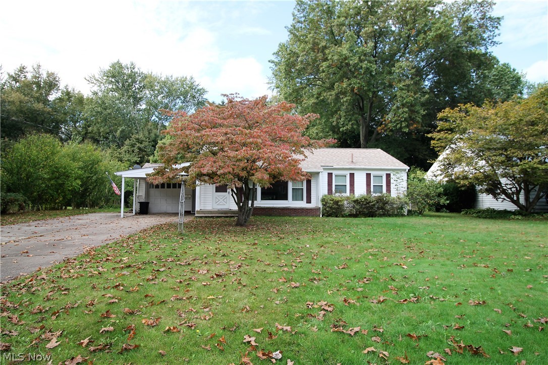 Come home to this charming two possible three bedroom, two full bath ranch home. Front porch has a flower bed just below the living room window. The large living room has gas fireplace and mantle, newer windows through out the home, dining area offering built in shelves. The bright, inviting kitchen offers abundant of cabinets, pantry/or broom closet, refrigerator and stove. There is a room off of the kitchen that could be an office, bedroom, workout area etc. Also there is a large closed in sunroom with windows that open and has so much room to entertain or just sit out and relax. The bright, neutral full bathroom and two bedrooms with ceiling fans finish the main level. There is a finished waterproofed basement, full bath, newer furnace and hot water tank, updated thermostat, newer roof and siding. The huge backyard offers a tranquil feeling, it has plenty of room for entertaining, or just enjoying and a shed for all the outside tools. There is a one car attached garage. Precious m
