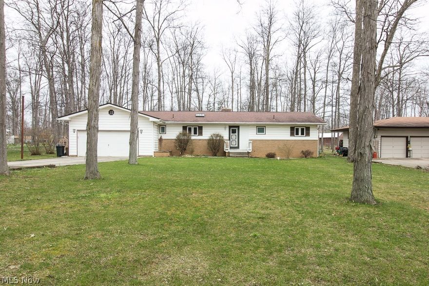 Welcome to this wonderful 3 bedroom 1.5 bathroom ranch style home situated on over ¾ acre private wooded lot. This home features a large eat in kitchen with ample cupboard space and an additional formal dining room. The beautiful hardwood floors flow throughout the living space and accent the beautiful wood burning fireplace. The generous sized 2 car attached garage adds convenience and don’t forget to check out the attached heated workshop perfect for the hobbyist. Additional updates include energy efficient vinyl casement windows throughout, stand alone central air added 5 yrs ago, newer boiler, new garage floor with French drain. This home has been loved and well maintained by the same family since the day it was built. A great value in a wonderful city close to shopping, dining and entertainment. Bring your modern touches to make this your new home.