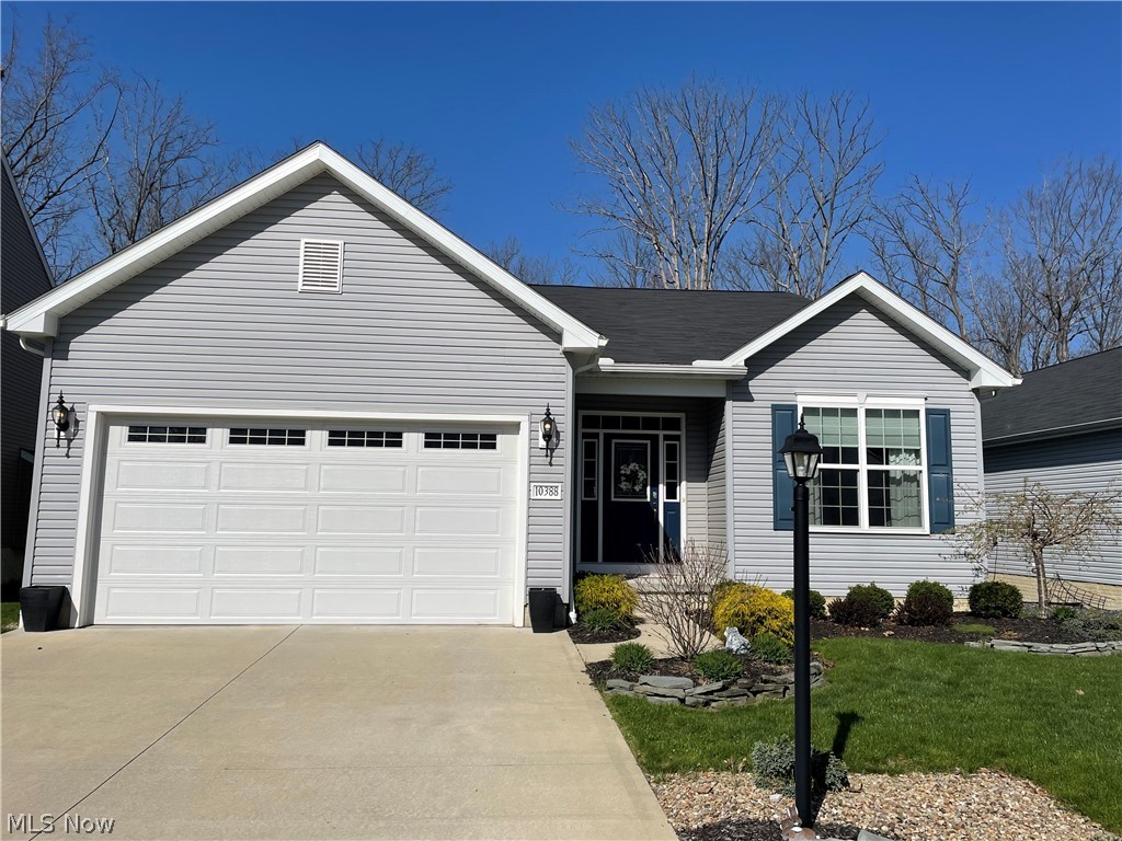 Just move in and enjoy this like new 2016 built 3 bedroom 2 full bath ranch! The large open concept vaulted ceiling great room/dining area/morning room is a fabulous space to gather especially with the cozy stone fireplace! The gourmet kitchen is open to the great room area and features custom light fixtures, white cabinets, granite countertops, SS appliances (microwave new 2021, dishwasher new 2022), and 5-burner gas range. Plenty of natural light flows in from the morning room which includes the sliding glass door to the outdoor entertainment area featuring the 10' x 15' composite deck (2017) and access to the fabulous stone patio (2019). The spacious primary bedroom features a private en suite bath with double sinks and large shower in addition to the closet of your dreams with its own corner vanity! 2 additional good sized bedrooms and second full bath complete the main floor. Lower level is well lit with large garden windows, and home includes Security System (Guardian). Additiona