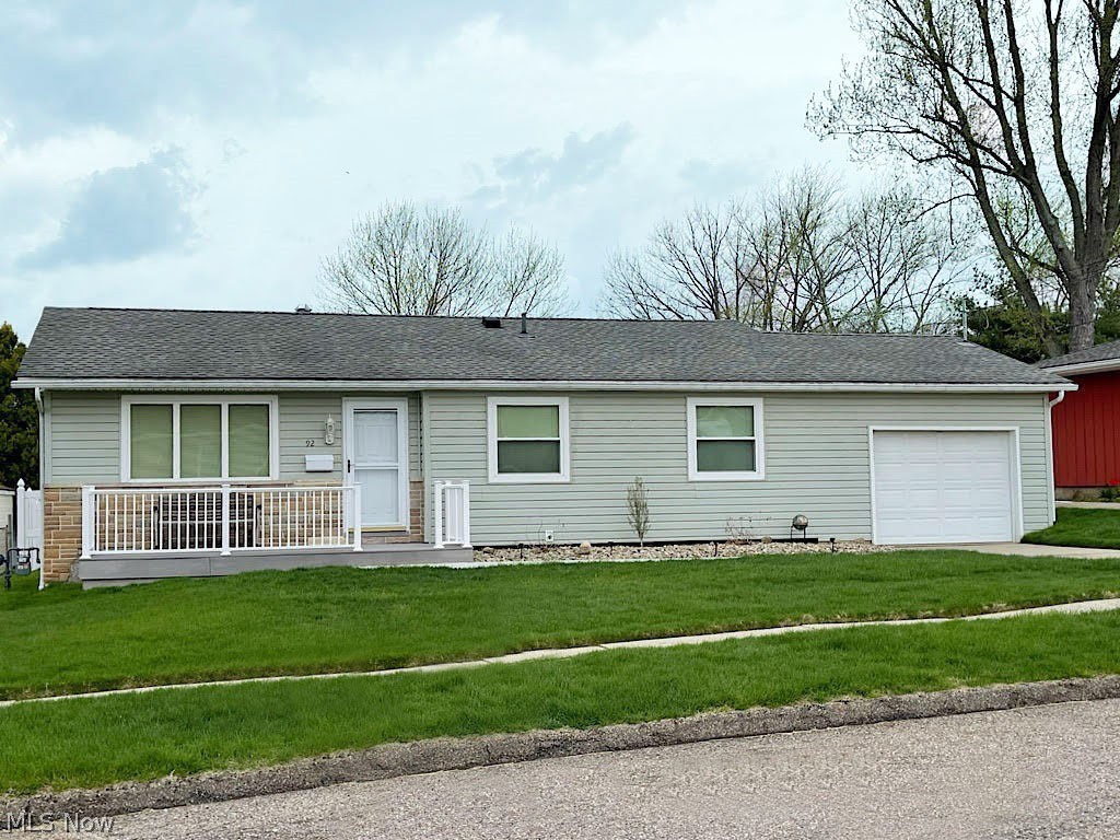 Been holding out for a meticulous, easy-to-care-for, one story ranch home? Well, you just hit the jackpot. This turnkey gem in Mogadore has been in the same family for over 40 years. During that time if something needed done, it was done. The living room, dining area and kitchen have a nice, open feel. The spacious living room is light, bright and large enough not only for multiple couches or chairs for seating, but will also accommodate a large entertainment center. The pretty oak kitchen has loads of cabinets, drawers, shelves and appliances, which all stay. There’s even a handy, folding space-saver wall-mounted kitchen table! The bedrooms are good sized, there’s hardwood floors under carpet on the main level, and beautiful hand-crafted woodwork throughout. If you ever wished you had a lower level large enough for a ping pong table or extra tables for family game night, you're in luck. There are 3 separate rooms downstairs, and the space is fantastic. The real show stopper is the fully-fenced, spacious back yard with a 22 ft. long covered deck where you can sit and watch family and friends have fun in the in-ground pool for hours. Improvements over time include the roof, water heater, vinyl windows, furnace and air conditioning. If you like the outdoors, you can take advantage of the Buckeye Trail and Mogadore Reservoir, a great spot in the area for fishing, boating and wildlife, too. You won’t want to let this one get away!