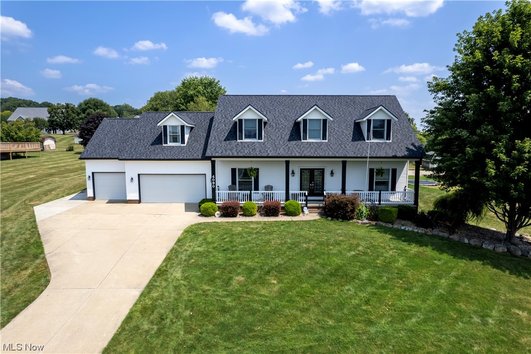 Welcome to this 5 bedroom, 4 bathroom Modern Farmhouse with breathtaking views. Located in Triway Titan territory, on a one acre lot . The newly completed multi level deck overlooks a kids paradise, complete with your own basket ball court, in ground trampoline, hot tub, and room to run! With 5 bedrooms, there is space for everyone. A 3 car garage, outdoor shed, and space in the lower level offers plenty of storage. The large great room has a gas fireplace that leads into a spacious kitchen with granite counter tops and beautiful stainless steel appliances. There are plenty of options to expand your living space in the walk out lower level. Current owner has started the process with a finished full bathroom, framing, electrical, and much more, offering hundreds of additional square feet of living space. Seller is offering a one year home warranty. If your looking for the perfect blend of modern convenience and countryside living this property is for you!
