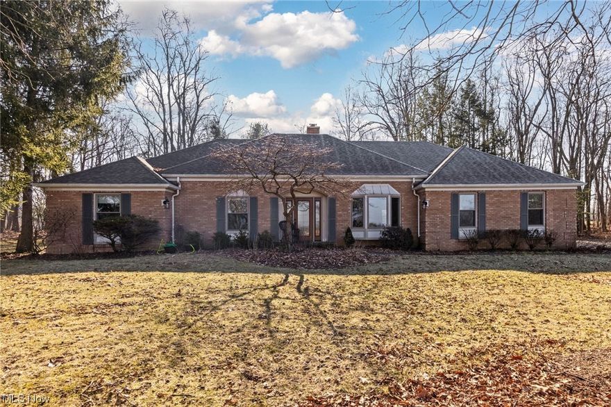 Beautiful, well maintained brick ranch in Ontario local school district. This sprawling ranch offers 3 bedrooms 2 full and 1 half baths. An eat in kitchen open to the living room and perfect for entertaining. The owner's suite offers a large attached bathroom and access to the outdoors.  Outside is a nature lover's dream. Situated on just over 5 acres and backing up to Twin Lakes golf course; a serene spot enjoy your morning coffee and views on the brand new composite deck. Enjoy your walks on the gorgeous one acre cut grass labyrinth sewn with native wild flowers. This home has many updates, including new paint throughout, plumbing, septic and electrical updates . New furnace and central air, new appliances, quartz countertops, flooring, new windows and doors throughout, chimney upgrades and a high efficiency indoor wood burner. This is the perfect home to move right into and relax.