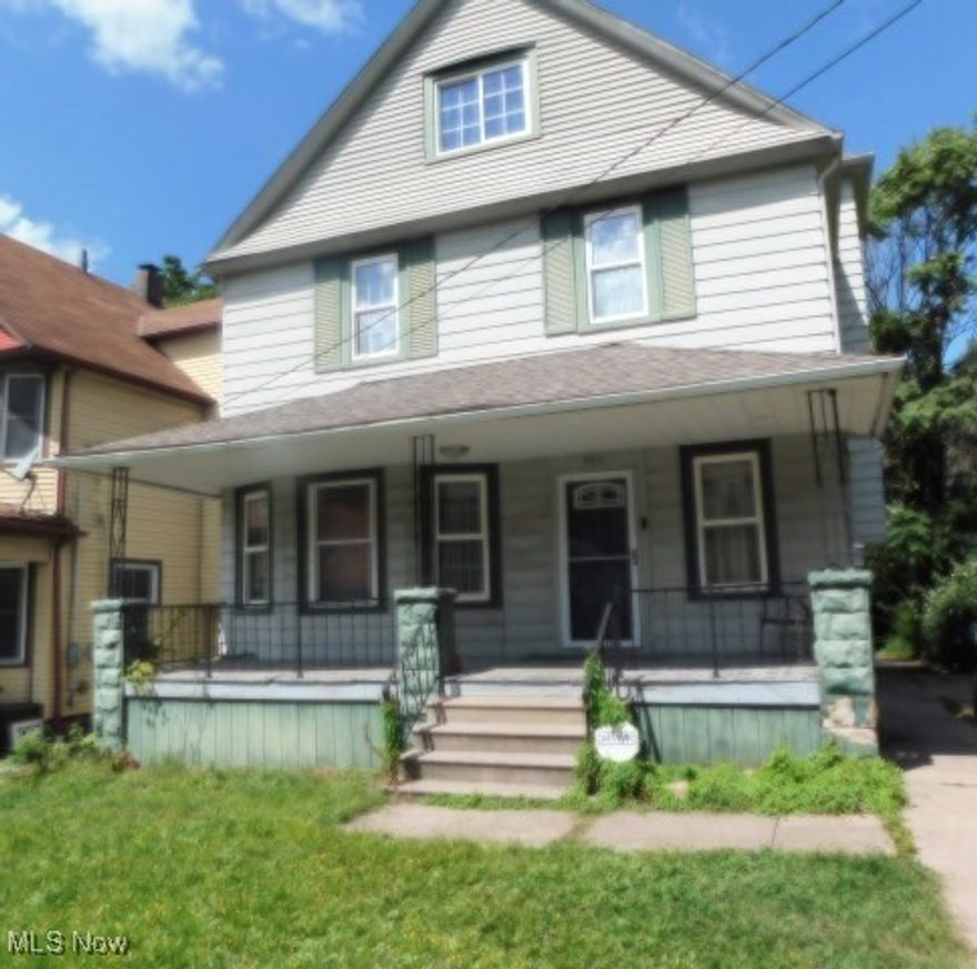 Why buyers and investor will this this home. Fix and hold or flip this spacious and entertaining size colonial. Bring your vision and add value with paint, flooring, kitchen and bath refreshes and appliances! Formal dining room for hosting holidays and family meals and huge living room with a bay window and space for all your oversize furniture, plus another room that can be used as a family room or play area. Kitchen with lots of cabinets and counter space. Upstairs are 4 bedrooms and a full bathroom and walk up to third floor with another huge oversize bedroom has its own c/a and furnace thru the wall. Walk downstairs to a full basement that adds storage/workshop space plus your laundry area and block windows. Detached double garage. Large front porch to relax and sip that glass of iced tea or a cup of coffee and another back porch off kitchen. Extra lot approximate size 48x61 is part of this property for planting your city garden. Great location to all highway, minutes from downtown Cleveland, shopping and much more. Great home with a great price. Make your appointment to see this home today!