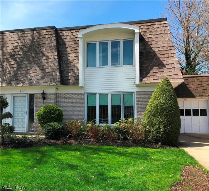 Prime location in this spacious and sunlight filled townhome in Villas on the Green! Ceramic tiled entry leads to oversized living and dining rooms with hardwood floors. Enjoy the view from the living room picture window. Generous dining room has built-ins and wet bar for all your entertaining needs. Eat-in kitchen offers ceramic tile, double ovens and gas cooktop. Relax in the family room with custom cabinets, beamed ceiling and sliding door that leads to the exquisitely landscaped fenced in back yard with paver patio and water feature!! 3 ample bedrooms on second floor including Master Suite with walk-in closet, dressing vanity and shower over tub. Guest room and bedroom being used as an office share a large hall bath. In suite laundry on first along with mechanicals. Community Pool for Summer fun! One car garage is attached and one is detached. Delightful unit, rare find. Lovingly maintained by long term owner.