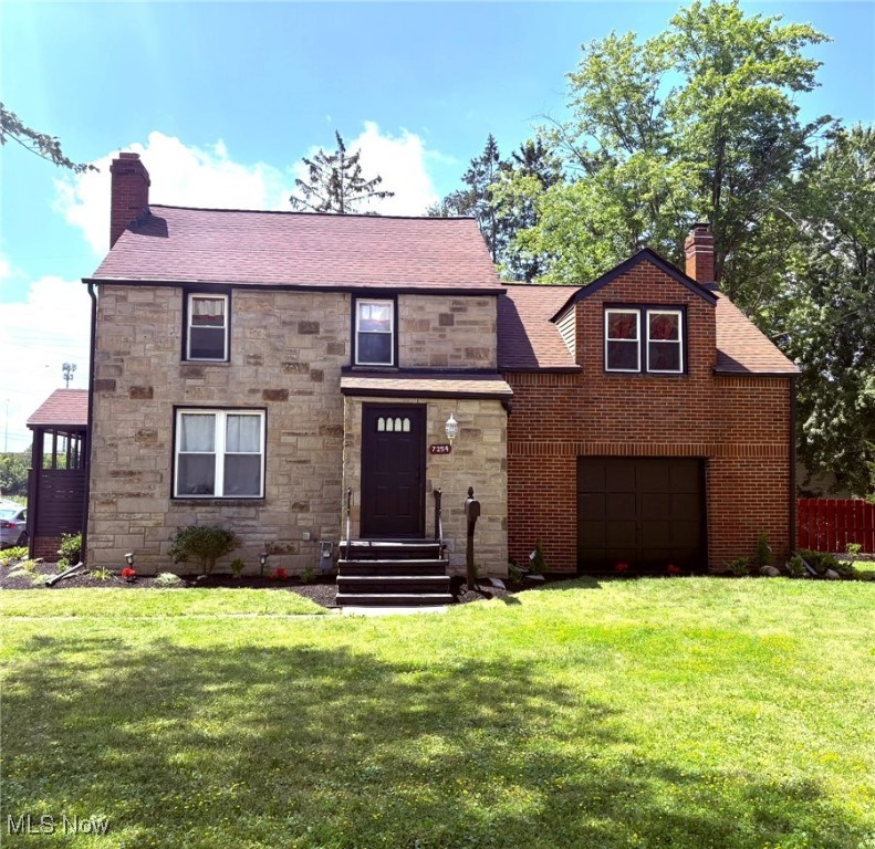 Charming Brick Colonial | 3 Bed, 2.5 Bath | Beautifully updated brick colonial offering 3 bedrooms and 2.5 bathrooms. Features include fresh interior paint, recessed lighting, and new flooring throughout. The brand-new kitchen boasts quartz countertops, tile backsplash, new self-closing cabinetry, luxury vinyl flooring, and stainless-steel appliances. The main level includes a dining room, cozy living room with fireplace and shiplap accent wall, and a half bath. Upstairs features three bedrooms with new carpeting and a fully renovated full bath with ceramic tile and modern finishes. Enjoy the spacious recreational room located in the attached garage area—perfect for additional office, or playroom. The partially finished basement includes a second full bathroom. Major updates include: Roof replaced in Sept. 2017/HVAC 2017 and water tank in 2021. Exterior highlights: professional landscaping and a two-car detached garage. Located near the community recreation center and public library.