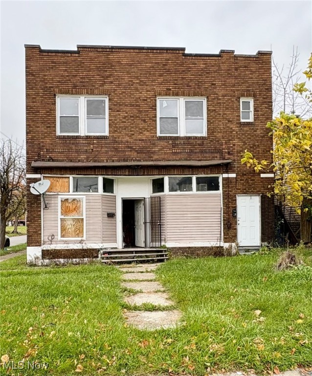 This is a rare investment opportunity located in the heart of Cleveland’s Kellys neighborhood. The property is a mixed use triplex featuring three residential units and a ground floor storefront/commercial space but it needs a total gut renovation. Perfect for seasoned investors or contractors looking for a full scale rehab project with significant upside potential.