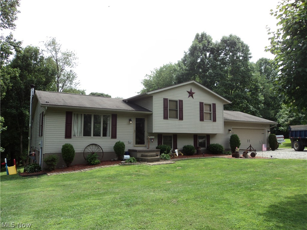 Wonderful Multi-Level home with an open floor plan featuring 3 bedrooms, 2 full baths, with an attached 2 car garage. This home is situated on
a level 2.29 acres with an above ground pool, large back deck, and a very nice back yard pond. Freshly painted inside, New central air, new
flooring throughout & much much more ! Home Warranty.