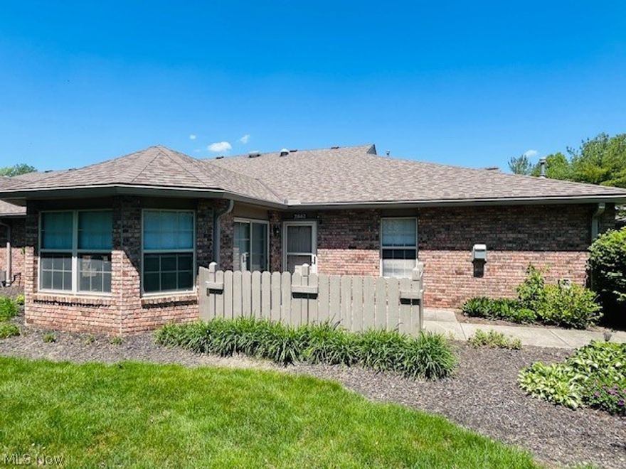 Welcome to your dream home! This stunning 2-bedroom ranch-style condo nestled at the end of Devonshire Meadow complex offering privacy & serene views of a lush grassy area and trees. Enjoy peaceful moments on your private patio. Step inside to an open living room with soaring cathedral ceilings that flow seamlessly into the kitchen & dining area, divided by a charming beam. The kitchen has been beautifully renovated with cherry wood cabinets, undermount lighting & enhanced by a tubular solar light. Sleek white quartz countertops with grey marbling accents & a new chandelier add elegance to the space. Living room, kitchen, dining area, hallway & sunroom feature new LVT flooring. The light-filled sunroom with lofted ceilings, one of the few in the complex, boasts a slider to the patio and stylish French doors between the living room. Relax in the cozy family room with a corner, stone-front gas fireplace and built-in corner cabinet. You'll appreciate the craftsmanship of natural woodwork & trim, crown molding in the family room, sunroom & primary bedroom & 6-panel solid wood doors throughout enhance the charm of this home. No matter what room you are in, you can enjoy your favorite tunes with the surround sound system. Down the hallway, you will find an updated main bath. The primary bedroom offers a private full bath with easy step-in shower, a vanity with Corian countertops & a spacious walk-in closet. The second bedroom is a perfect home office or craft space with built-in cabinets & desk. Enjoy direct access to the 2-car garage, which leads to a heated laundry room. Also a pull-down attic. The condo complex boasts amenities such as pool with a waterfall, community room with a fitness center, library & pool table, as well as basketball, shuffleboard, tennis, pickleball courts, walking paths, and RV/boat parking. With 1423 sq ft of living space, this trendy, updated unit rivals the others in the complex, offering 3 distinct living areas. Don't miss out on this gem!