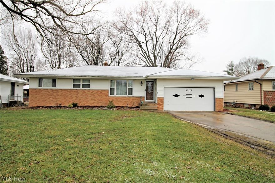 Welcome to this amazing Ranch home with open floor plan and gorgeous remodeled kitchen in 2014. Kitchen offers beautiful antique white soft close Kraft Maid cabinetry with tons of storage for all your kitchen essentials. Beautiful Corian counter tops and a fantastic farmers sink, all newer stainless steel appliances, corner cabinet with storage above and extra drawer space and a built in spice rack underneath the cabinet. Off the kitchen side entry is a half bath for your convenience. From the spacious kitchen you will enter the dining area and open living room great for entertaining.  The dining area allows you to easily step outside from the sliding door to the Trex Deck for your outside enjoyment . There are three nice bedrooms as well as a full bath. The full bath was remodeled in 2013, all hardwood floors throughout. Ample space in the finished basement with area for working out, or watching your favorite movies along with a whole other side for storage. Lovely huge fenced back ya