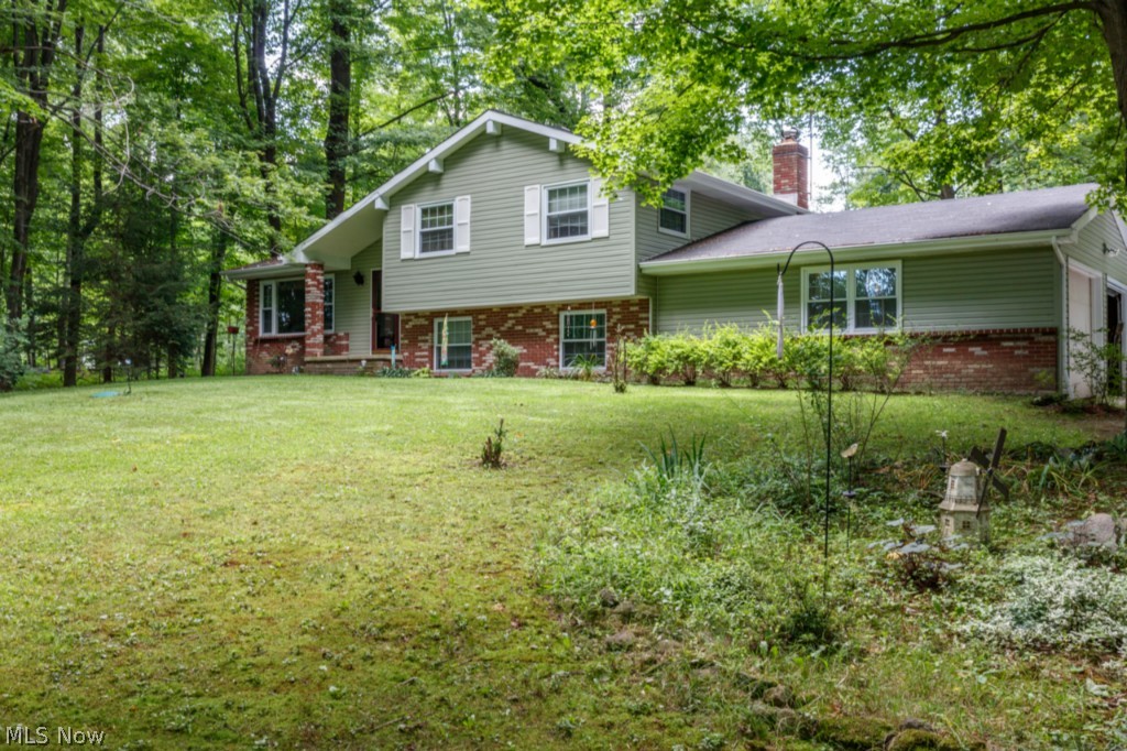 Charming four level Split with 4 Bedrooms and 2 Bathrooms all situated on a 2 acres lot. This Home has the capability of horse property with a 25 x 25 3 stall horse barn. Spacious 20’ Family room with a stone fireplace and woodburning insert. The formal Living Room and Dining Room both feature vaulted ceilings. Eat-In Kitchen with oak cabinetry and newer faucet. The first floor 4th Bedroom features a full Bathroom and there are 3 additional Bedrooms on the upper level. This Home features newer roof, vinyl windows and siding, well pump, and is a great value that only needs cosmetics! Don’t miss out!
