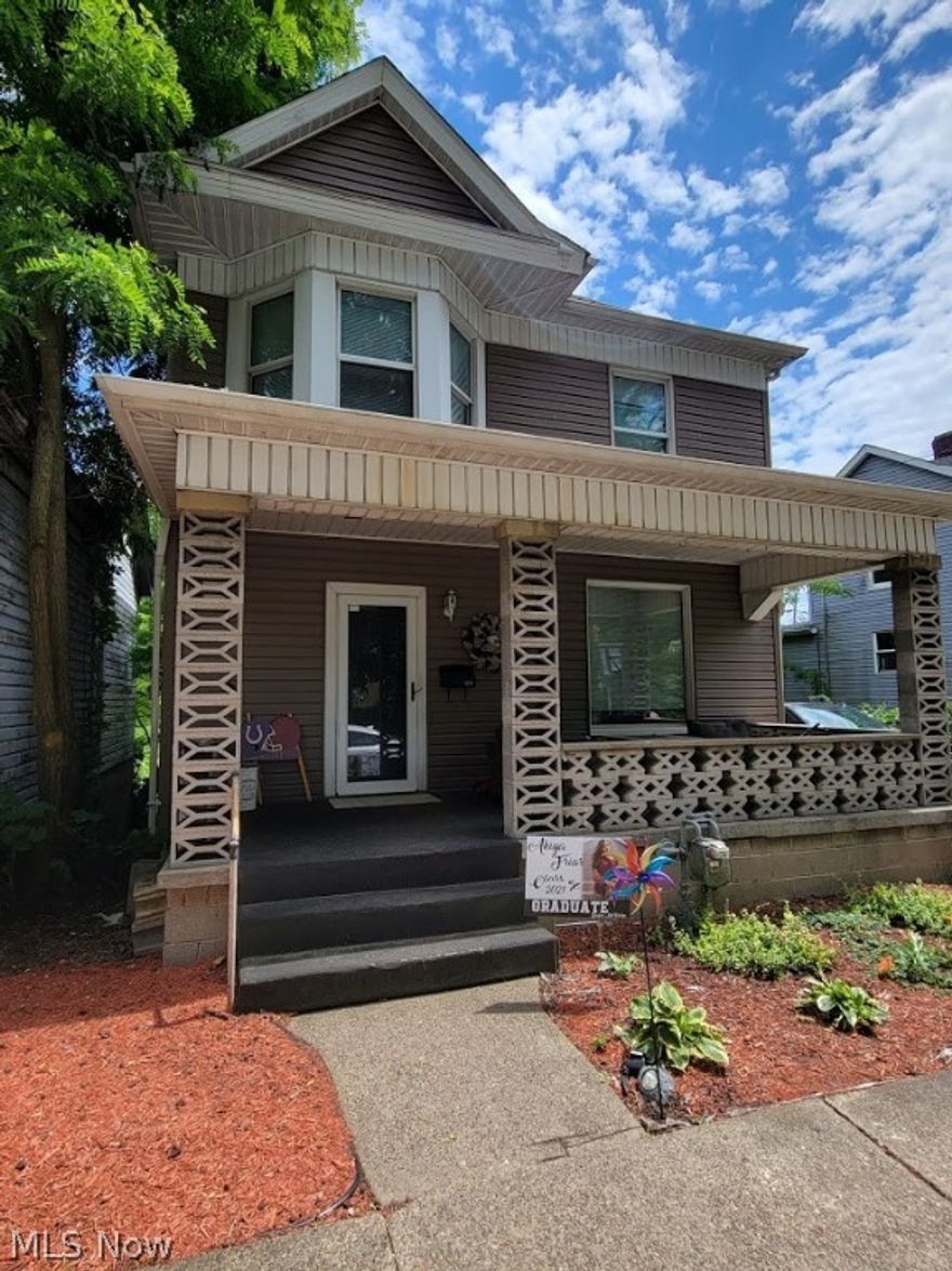 Wow.  Beautiful woodwork throughout the home. NEW Kitchen. This is the perfect 1st home for your family.  Large open rooms throughout the home with a Large Foyer Area, and large bedrooms. Located in a quiet neighborhood.  New Toilet is being installed in 2nd bath.  The lot extends on the side for off street parking as well as in the rear beyond the shed.  Seller just hasn't cleared the weeds or trees.