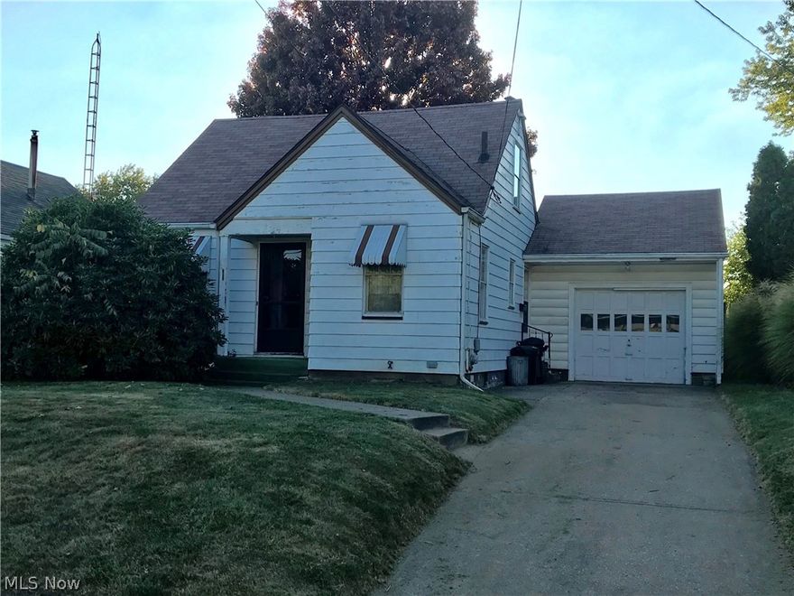 Adorable Bungalow great for first time home buyers or families.  Home has a large fenced in backyard and newer carpet.  Plenty of built-ins and hardwood floors in bedrooms.  First floor master bedroom and detached garage.