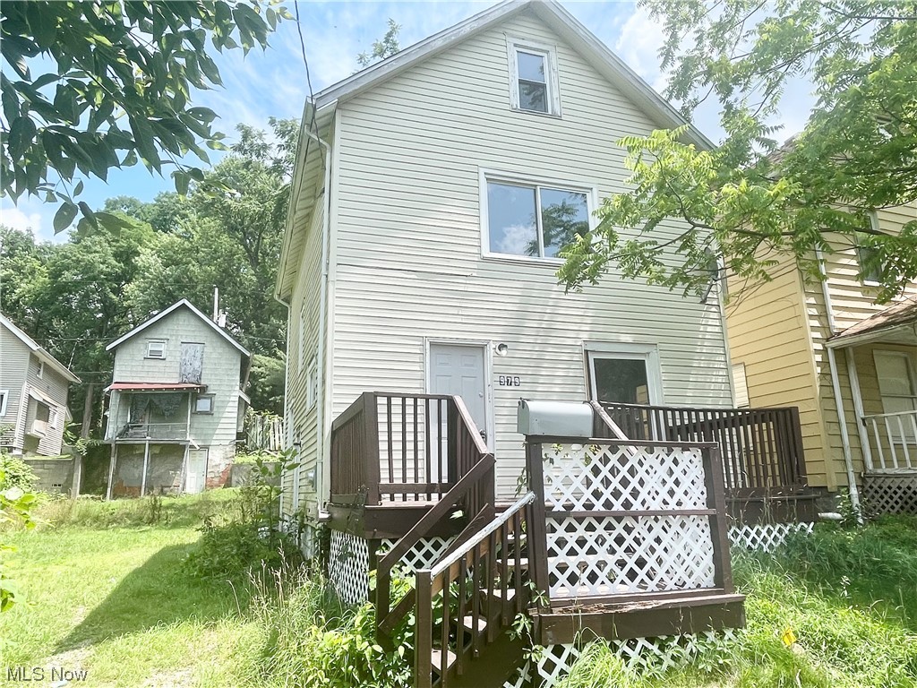 Don't miss this 2/3 bedroom colonial-style home in Akron Just minutes from downtown and Summit Lake!. Tenant occupied at $750 per month. 3rd floor is recently finished with drywall. Perfect home for an investment portfolio where buyer is willing to do the final touches. Fresh neutral paint throughout. New vinyl flooring as well. For full investment portfolio, sell also MLS numbers: 4417074, 4460901, 4417079, 4416524, 4414873, 4416442.