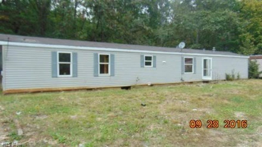 Manufactured home on 24.29 acres just outside of New Lexington. Selling "as is", no repairs to be made to property.