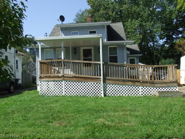 Fresh paint and new carpet in this move-in ready North Hill bungalow! Large living room with built-in window seat and separate office nook sets inside the front entry from the heated sun room style-enclosed porch. Formal dining room with another original woodwork built-in window seat leads to the sunny eat-in kitchen. A convenient side entry mud room, large enough for a second sitting area or playroom, is off the kitchen. A first floor bedroom shares the full bath with a large, walk-in, accessible shower. Upstairs are 2, possibly 3 more bedrooms and full bath. A walk-out full basement has plenty of storage, a washer/dryer hookup, and another shower. The large 2 car garage has an enclosed three-season sitting room attached, right next to the paved patio. A ramp at the front entrance for accessibility. Renovated and ready!